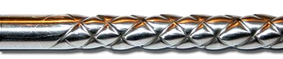 Close up of the AquaTherm stainless steel double helix tube used inside the heat exchanger